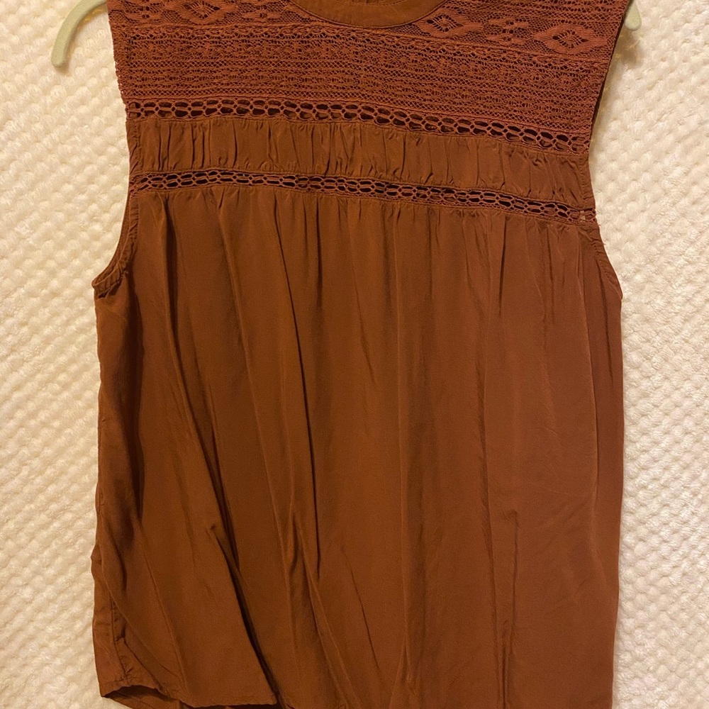 Old navy decor on chest top. Rustic orange